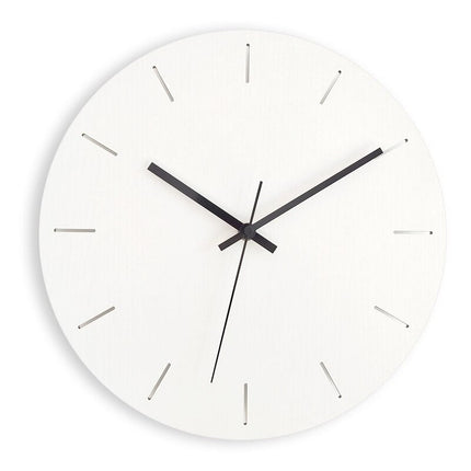 Yksinkertainen keltainen seinäkello olohuoneeseen