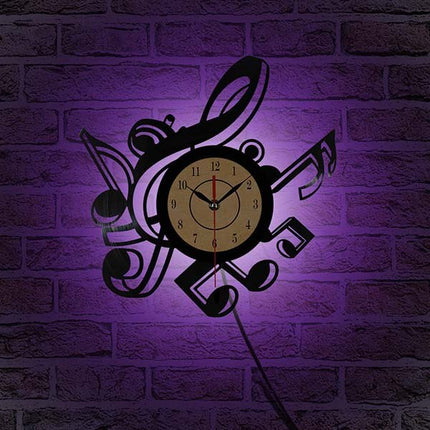 Musiikki vinyylikello nuoteilla