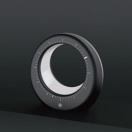 Moderni herätyskello ja kuunvalaisin