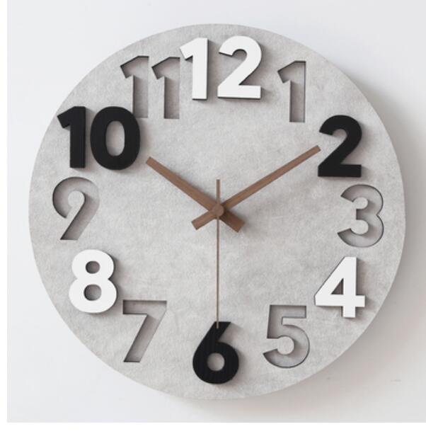 Moderni betonimainen seinäkello keittiöön