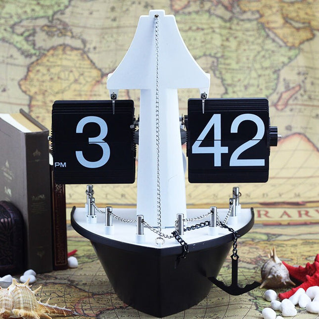 Veneen muotoinen kääntökello merelliseen sisustukseen