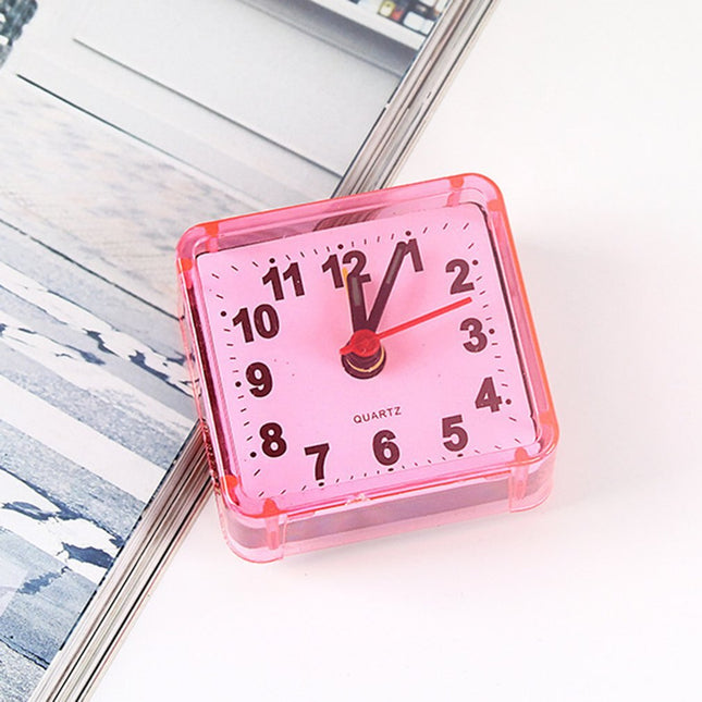 Pieni neliön muotoinen herätyskello