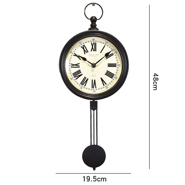 Retro heilurikello näkyvillä hammasrattailla