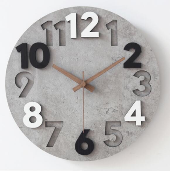Moderni betonimainen seinäkello keittiöön