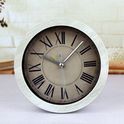 Pieni pyöreä vintage-pöytäkello