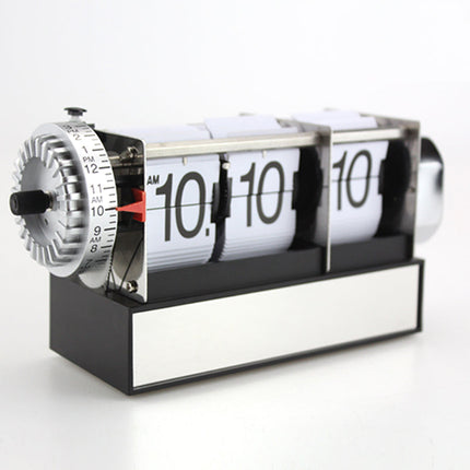 Pöytäkello kääntömekanismilla ja sekunneilla