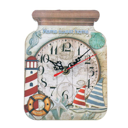 Keittiön seinäkello hillopurkin muodossa