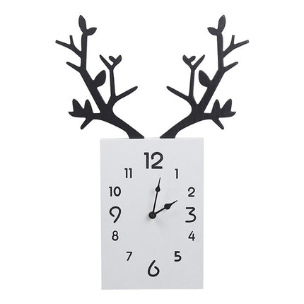 Design seinäkello peuran sarvilla