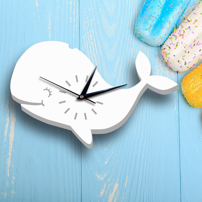 Minimalistinen valaan muotoinen seinäkello