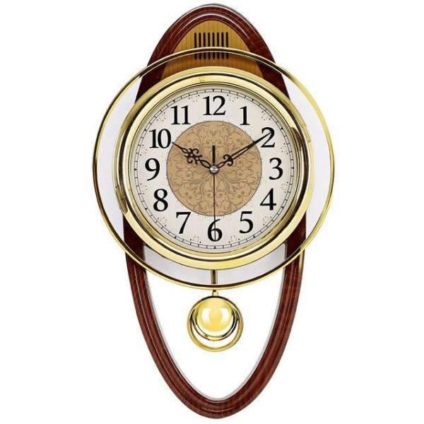 Perinteinen seinäkello kultaisella heilurilla