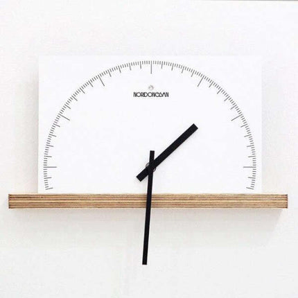 Minimalistinen puolipyöreä design-seinäkello