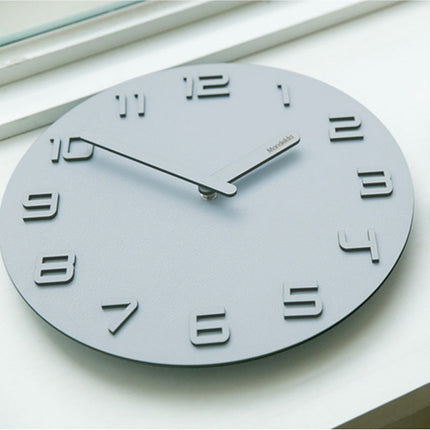 Puinen 3D-seinäkello kohonumeroilla