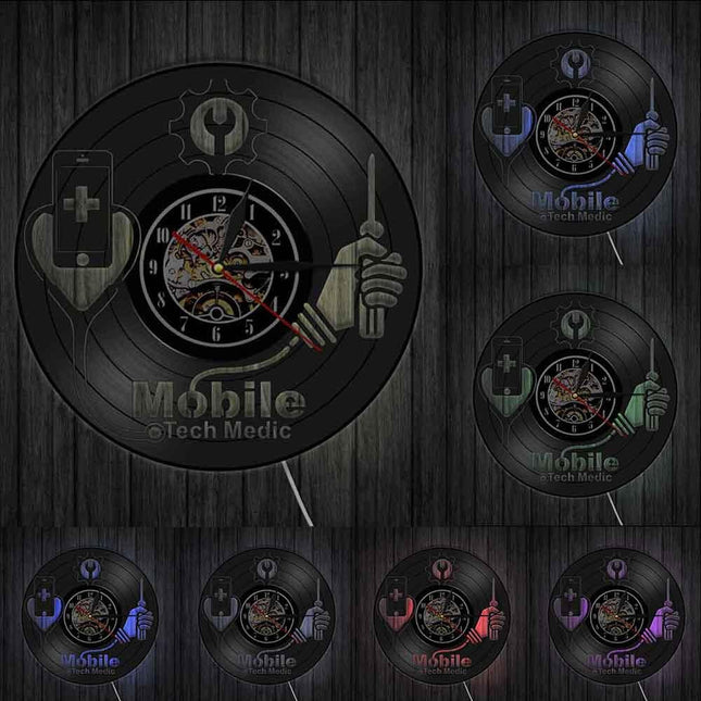 Puhelinhuolto-aiheinen vinyylilevy seinäkello