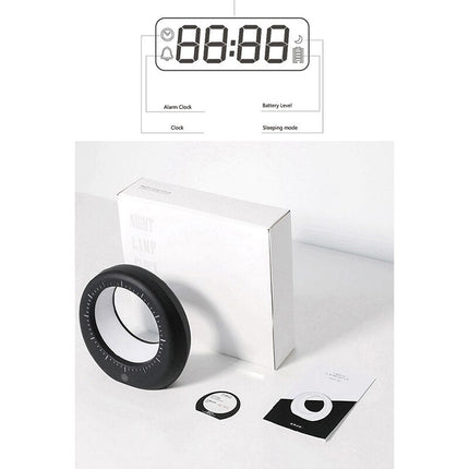 Moderni herätyskello ja kuunvalaisin