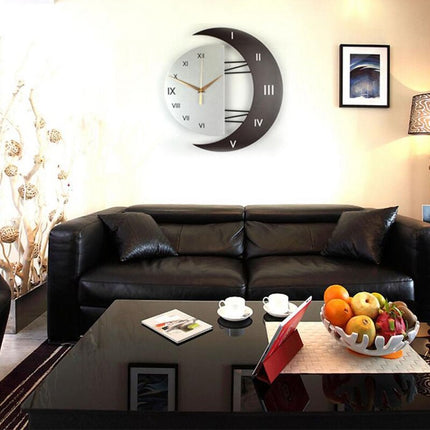 Kuunsirpin muotoinen seinäkello tähdellä