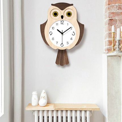 Pöllön muotoinen seinäkello lastenhuoneeseen
