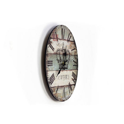 Vintage-seinäkello kruunu-kuviolla