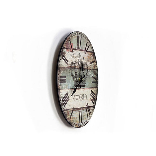 Vintage-seinäkello kruunu-kuviolla