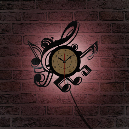 Musiikki vinyylikello nuoteilla