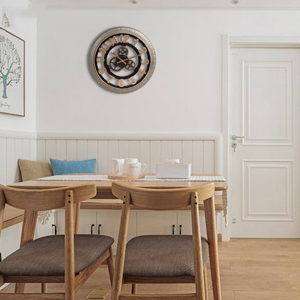 Industrial-seinäkello pyörä- ja hammasratasaiheella