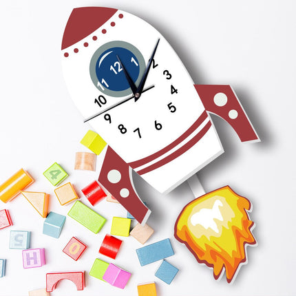 Raketti-aiheinen seinäkello lastenhuoneeseen