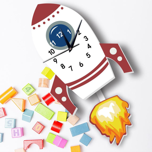 Raketti-aiheinen seinäkello lastenhuoneeseen