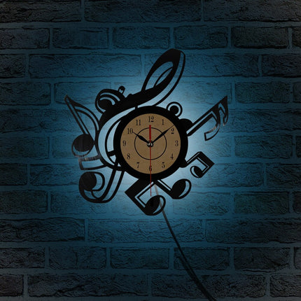 Musiikki vinyylikello nuoteilla