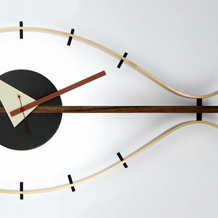 Silmän muotoinen design-seinäkello