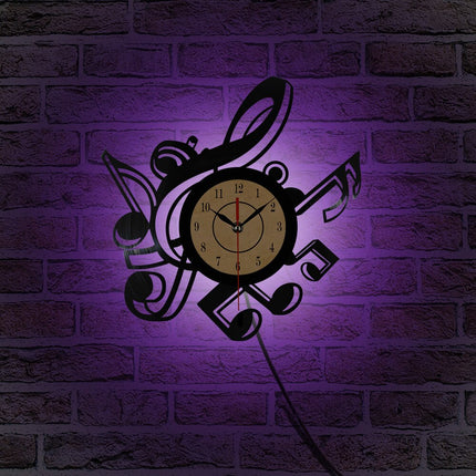 Musiikki vinyylikello nuoteilla