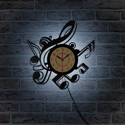 Musiikki vinyylikello nuoteilla