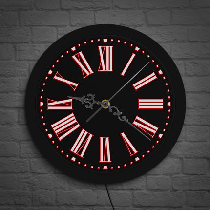 Musta LED-seinäkello roomalaisilla numeroilla