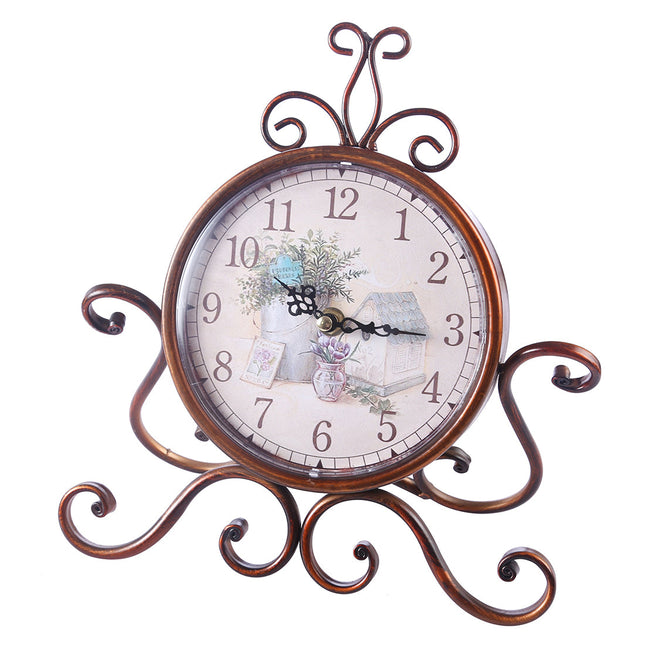 Koristeellinen vintage-pöytäkello metallijalustalla