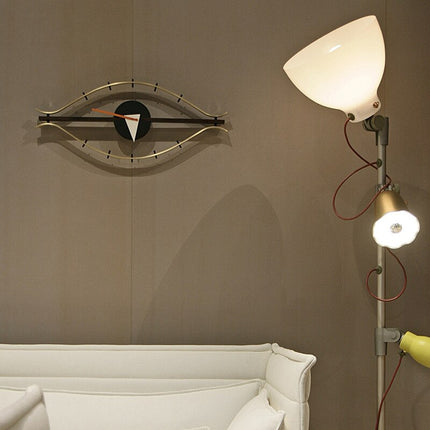 Silmän muotoinen design-seinäkello