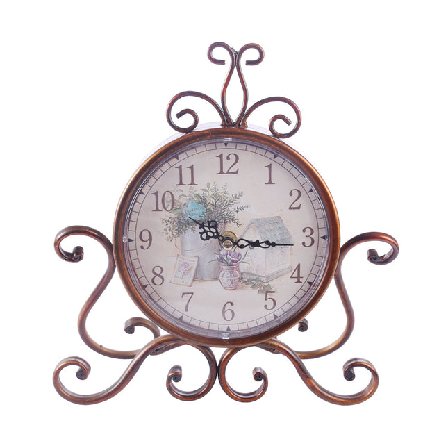 Koristeellinen vintage-pöytäkello metallijalustalla