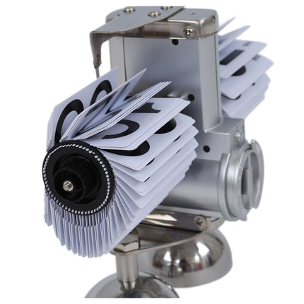 Mekaaninen retro fläppikello metallijalustalla