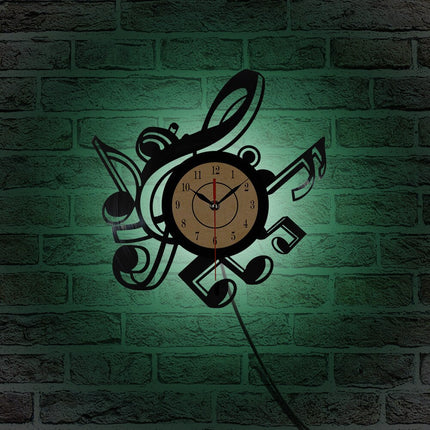 Musiikki vinyylikello nuoteilla