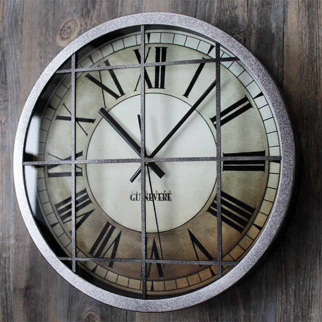 Teollinen musta metalliseinäkello ristikolla