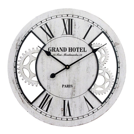 Rustiikkinen puinen seinäkello tekstillä