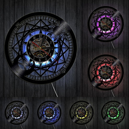 Kompassi-aiheinen vinyylilevy-seinäkello