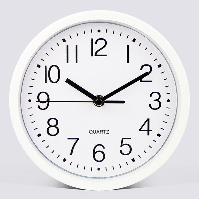 Yksinkertainen valkoinen pyöreä seinäkello