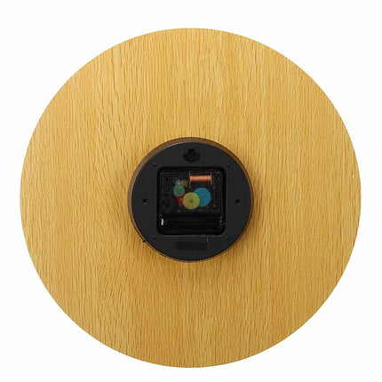 Pimeässä hohtava puinen seinäkello