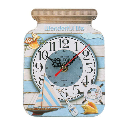 Keittiön seinäkello hillopurkin muodossa