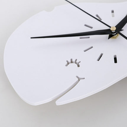 Minimalistinen valaan muotoinen seinäkello