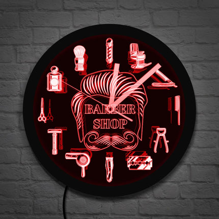 Parturiliikkeen seinäkello LED-valoilla
