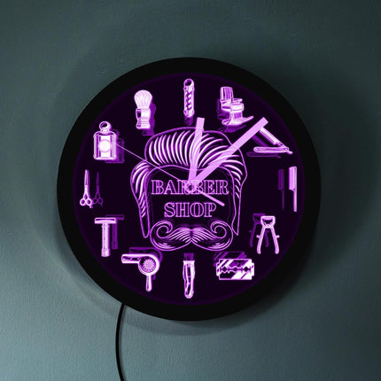 Parturiliikkeen seinäkello LED-valoilla