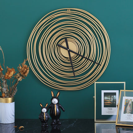 Kultainen spiraali design-seinäkello metallista