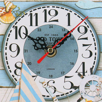 Keittiön seinäkello hillopurkin muodossa