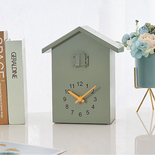 Moderni minimalistinen käkikello seinälle