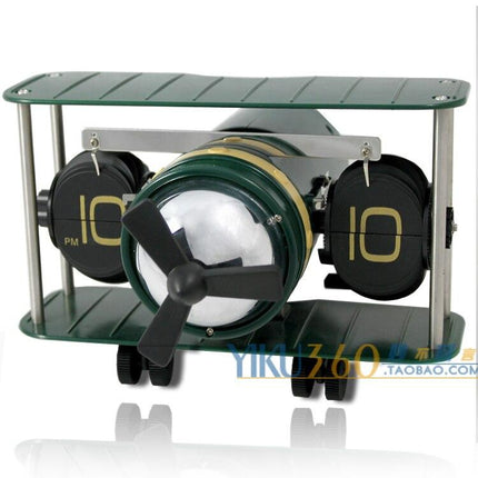 Lentokone-aiheinen mekaaninen fläppikello