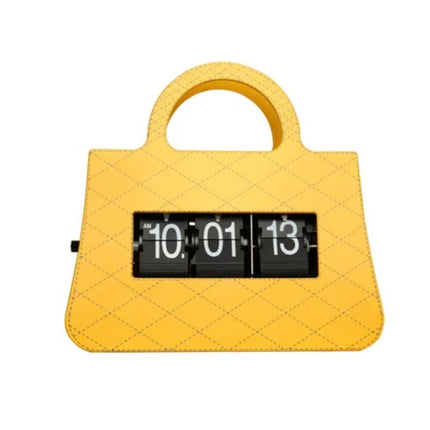 Käsilaukun muotoinen moderni kääntökello